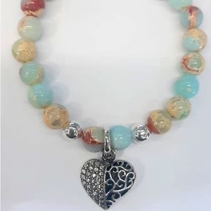Im selling nice bracelet with charm 950 sterling silver.